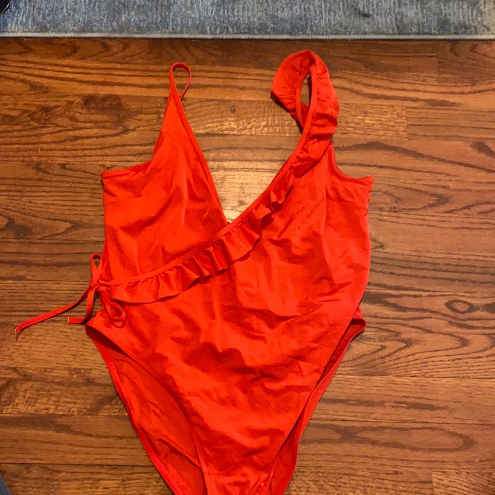 Low back ruffle one piece